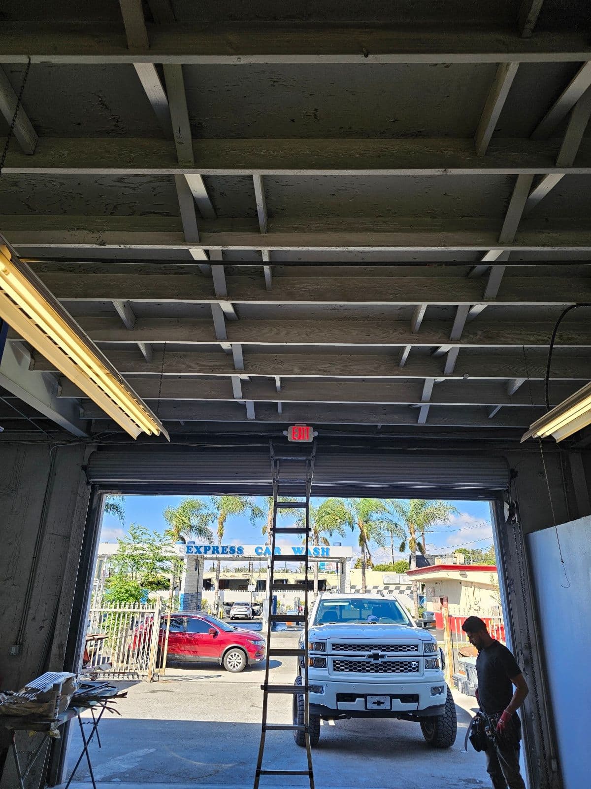 Exit Signs Installed in a Garage Space image